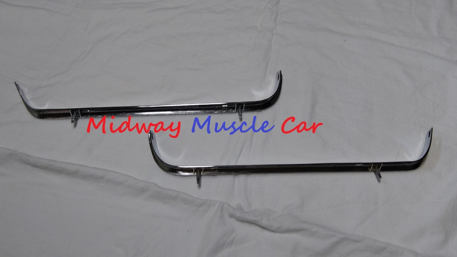 NEW chrome front lower valance panel moldings w/ holes (pr) 1969 69 Pontiac GTO