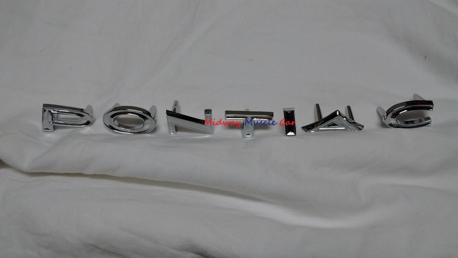 1966 66 Pontiac GTO rear tail panel P O N T I A C ornament emblem